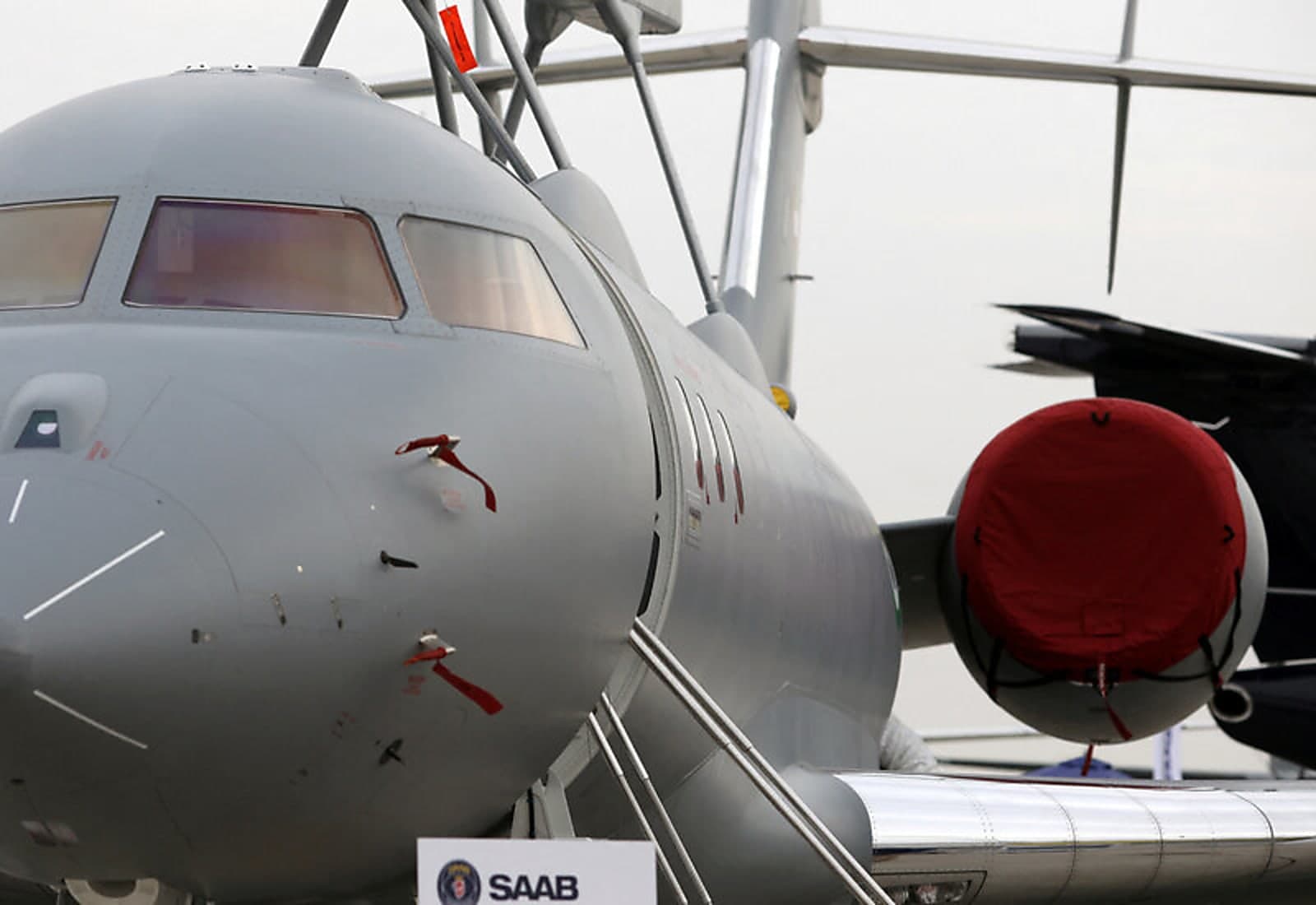 Canadian fighter jet with Swedish Saab aircraft in the background, illustrating the shift from US to Swedish defence suppliers